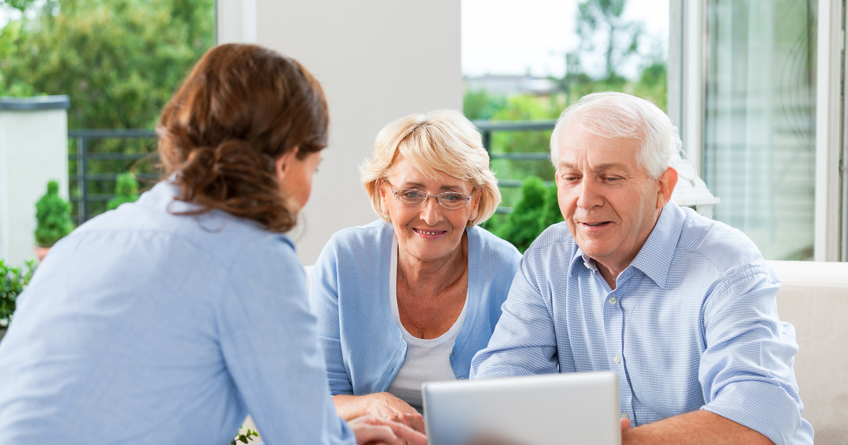 An elderly couple discusses caregiving options with their daughter.