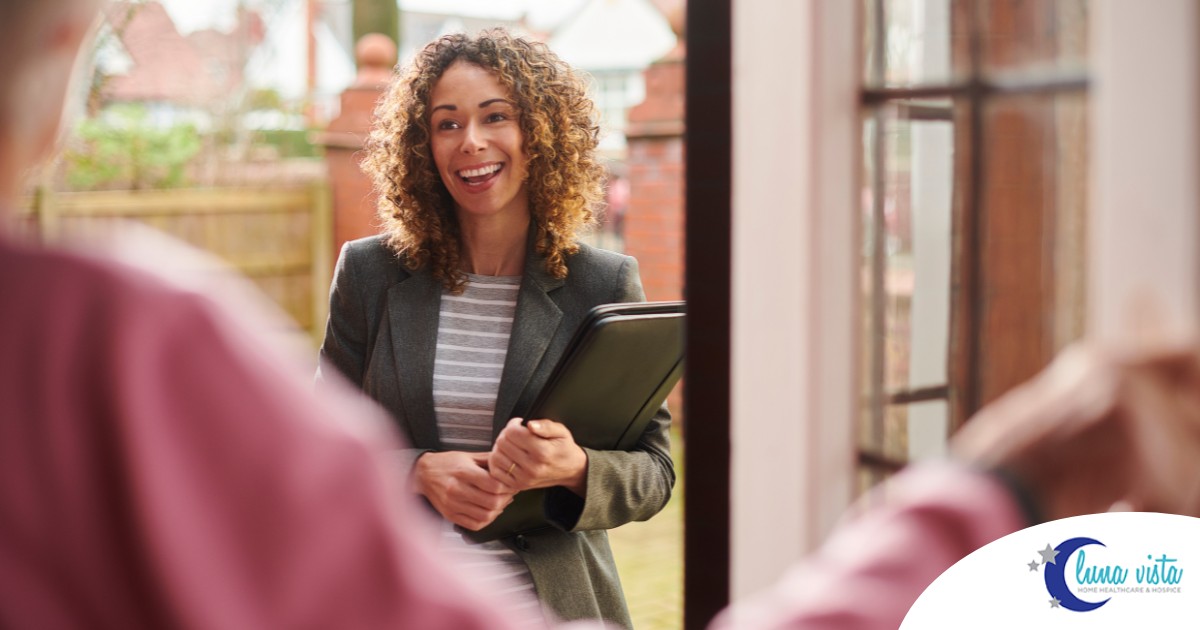 Medical social workers can make a massive difference for others, as represented by this professional visiting an older adult in the comfort of her own home.