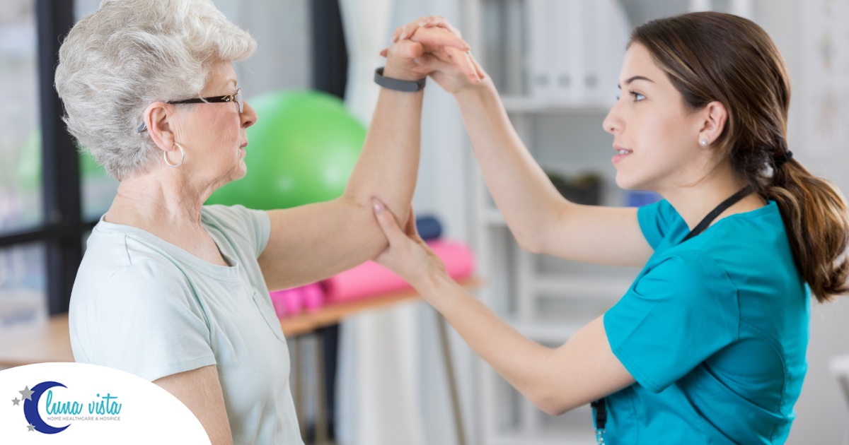 A physical therapist helps a senior patient, representing what National Physical Therapy Month aims to highlight.